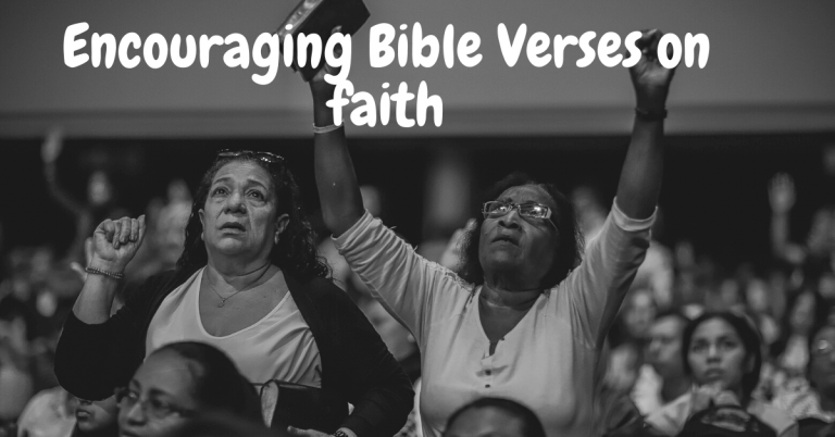 two women standing and raising hand in church wearing t-shirt